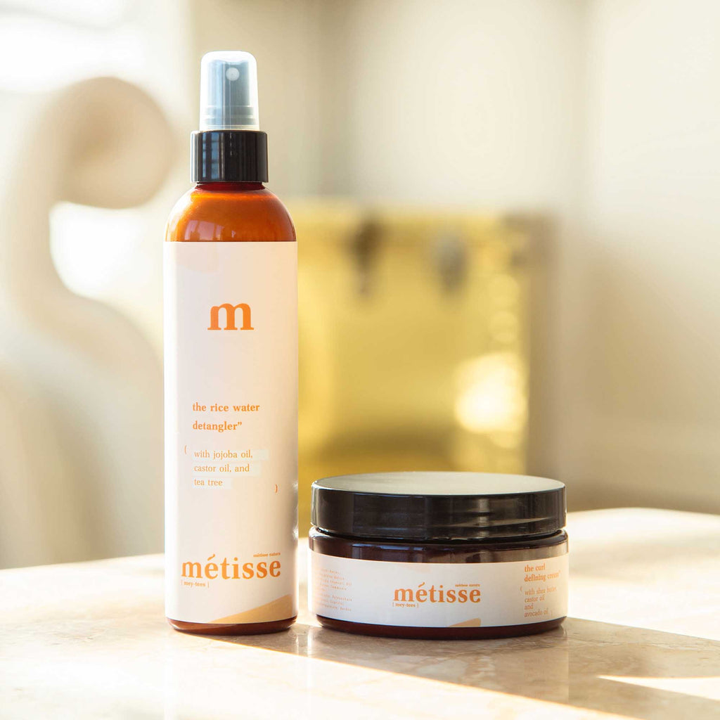 the duo by metisse natura composed of the rice water detangler and the curl defining cream for curly hair